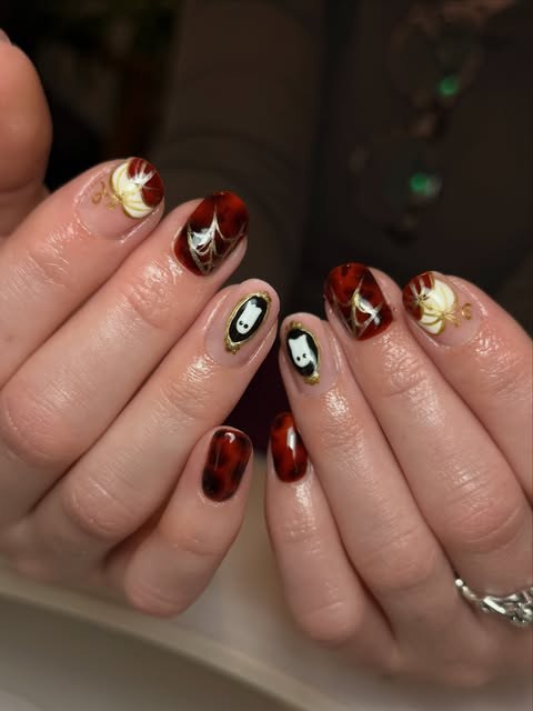 Halloween set: dark red tortoiseshell, little ghost charms, gold flourishes and cobwebs