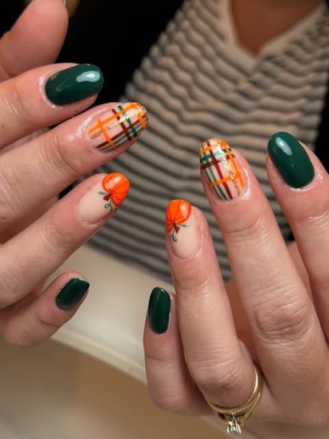 Autumn set: forest-green gloss nails with tartan and orange pumpkin accents